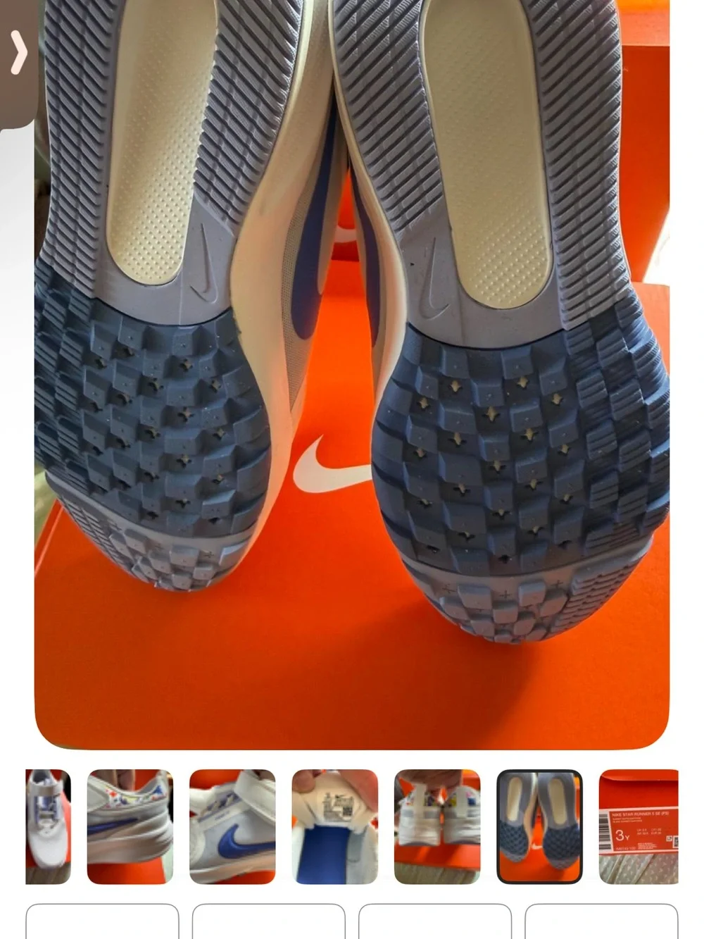 Nike White Kids Sneakers with Blue Swoosh and Multicolor Collar